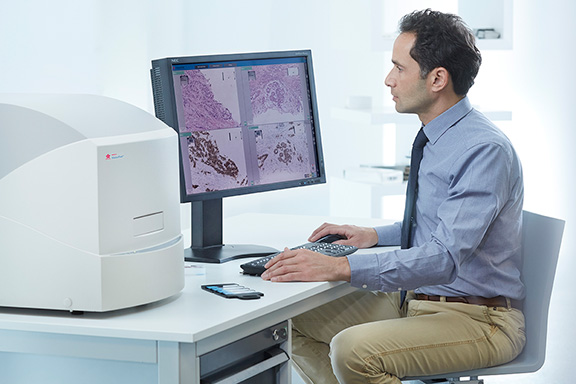 First hybrid digital microscope with live imaging and scanning: VisionTek®